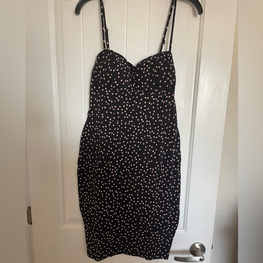 Black dress with pink polka dots